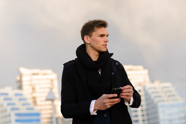 Young man with mobile phone