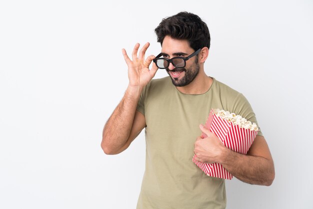 Young man with popcorns