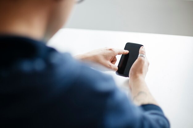 Young man with smartphone