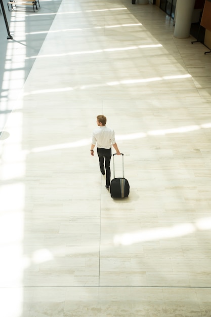 Young man with suitcase