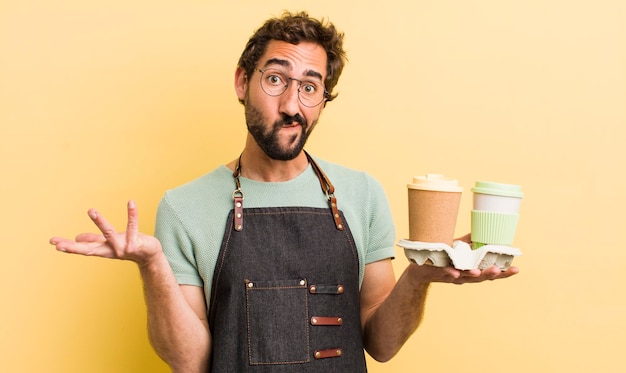 Young man with take away coffee