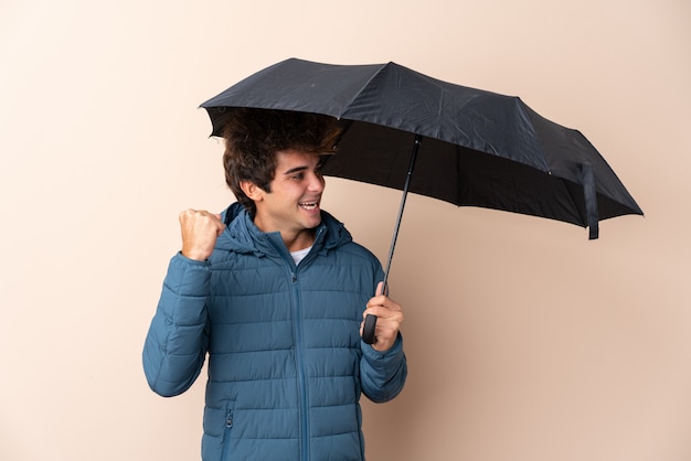 Young man with umbrella