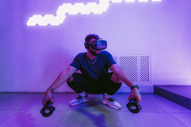 Young man with virtual reality glasses