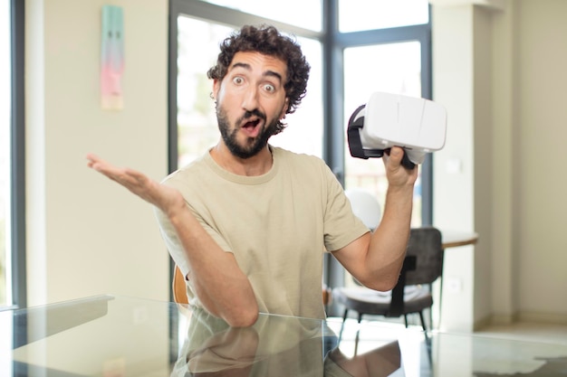 Photo young man with a vr goggles