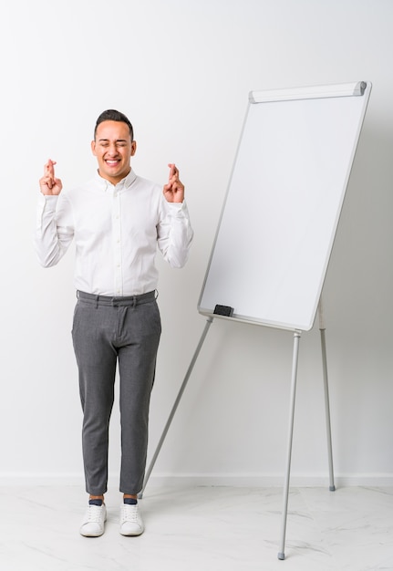 Young man with a whiteboard