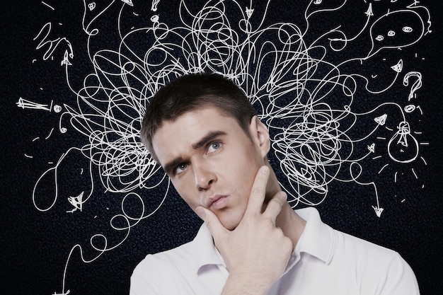 Young man with worried stressed face expression with illustration