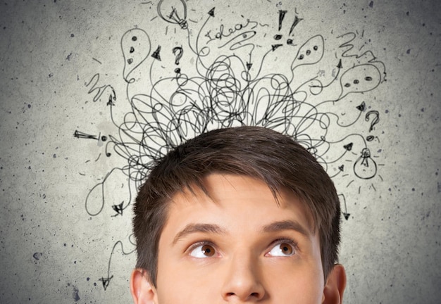 Young man with worried stressed face expression with illustration