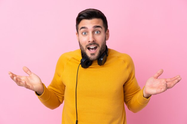 Young man with yellow sweater making a gesture