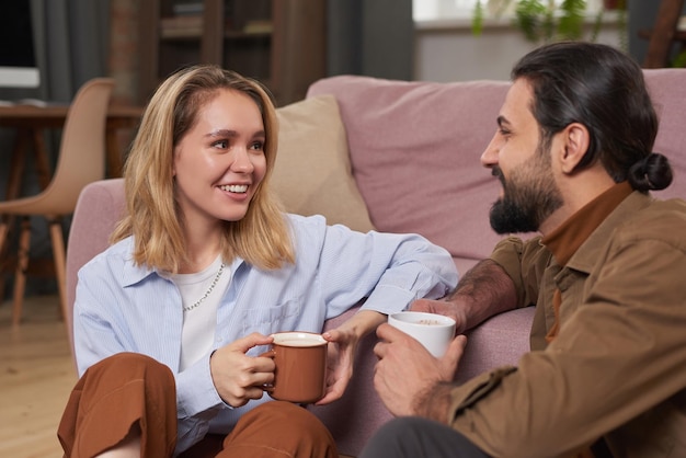 Young Man And Woman Discussing Plans