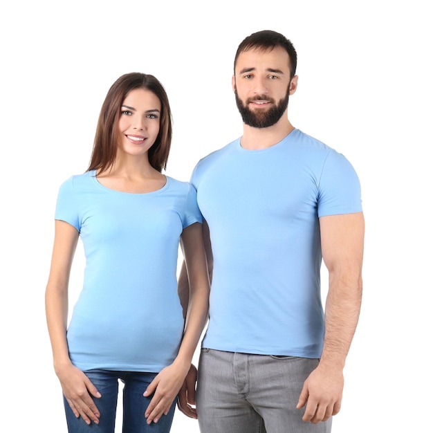 Young man and woman in stylish tshirts on white background Mockup for design