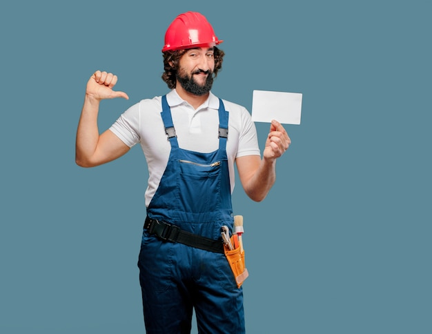 Young man worker with a placard