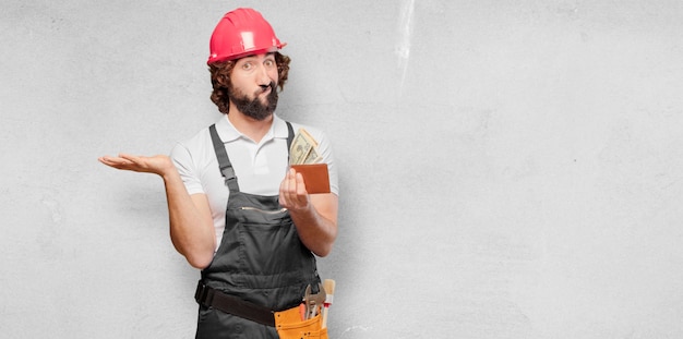 Young man worker with a wallet