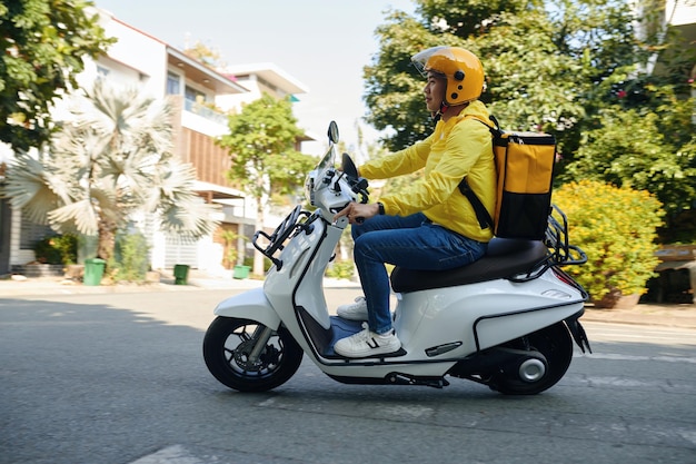 Young man working as courier