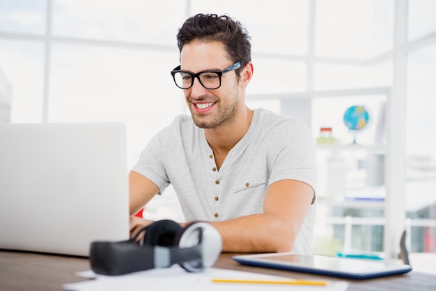 Young man working at his desk