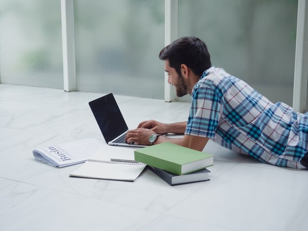 Young man working at home