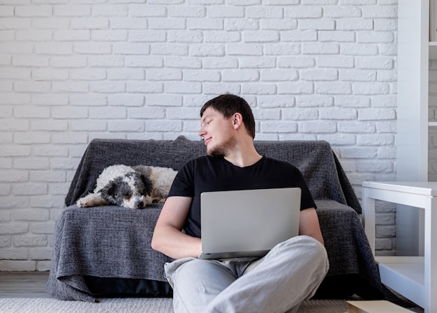 Young man working on the laptop from home