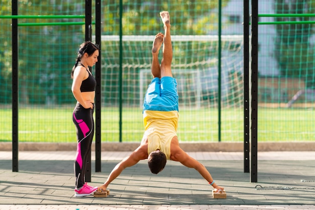 Young man in the yoga plank position