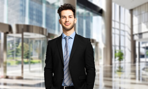 Young manager in a luxury modern open space business center