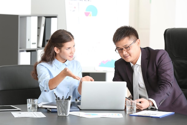 Young managers working in office