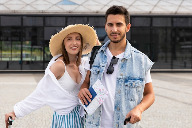 Young married couple at the train station.