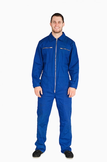 Young mechanic in boiler suit