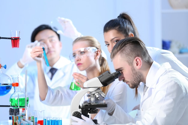 Young medical technicians working in laboratory