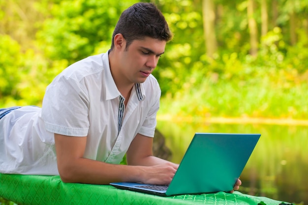 Young men with laptop