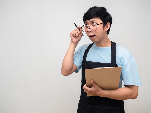 Young merchant gesture take off glasses for looking at copy space