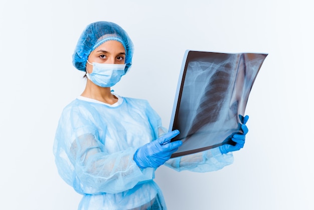 Young mixed race doctor woman holding a bone scan isolated