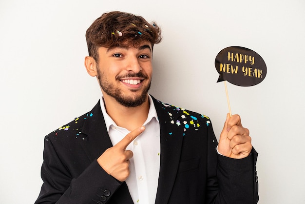 Young mixed race man holding new year props isolated on white background