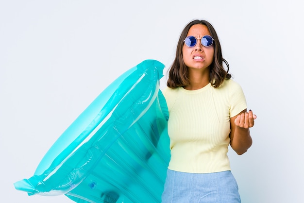 Young mixed race woman holding an air mattress showing that has no money.