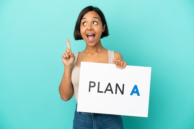 Young mixed race woman isolated on blue background holding a placard with the message PLAN A and thinking