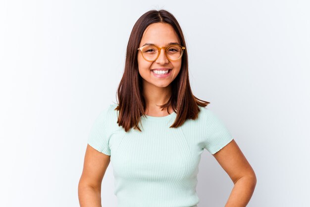 Young mixed race woman isolated confident keeping hands on hips.