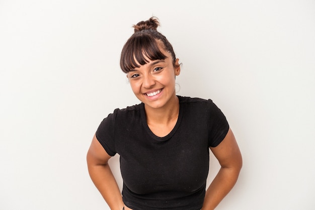 Young mixed race woman isolated on white background  happy, smiling and cheerful.