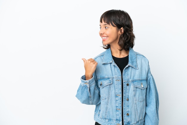 Young mixed race woman isolated on white background pointing to the side to present a product