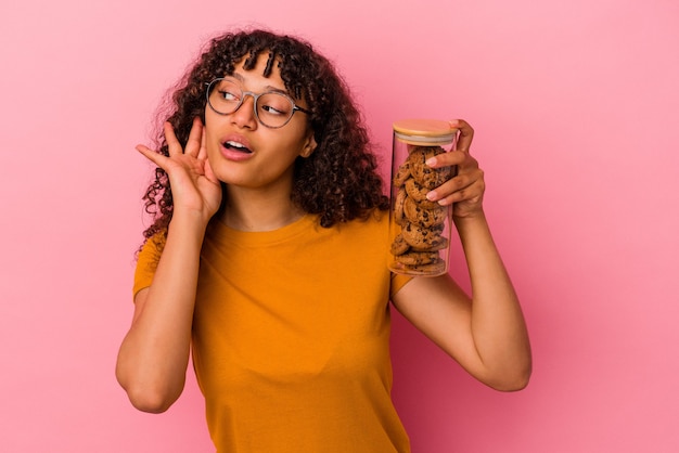 Young mixed race woman posing