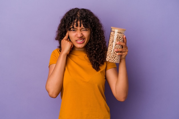 Young mixed race woman posing