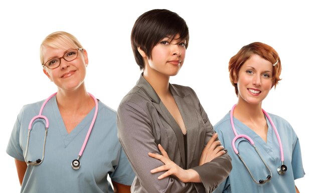 Young Mixed Race Woman with Doctors and Nurses Behind