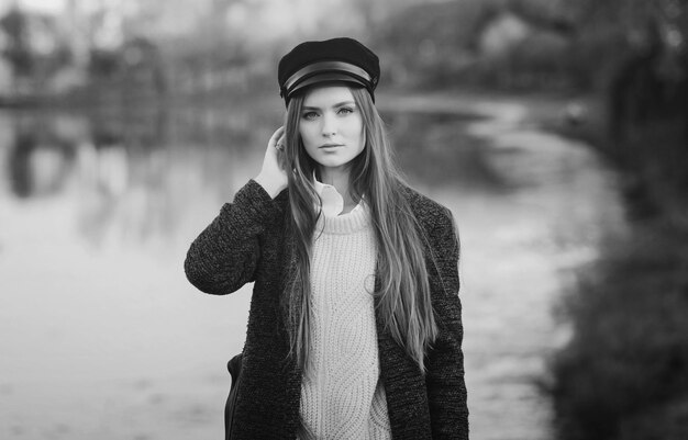 Young model girl in hat outdoor