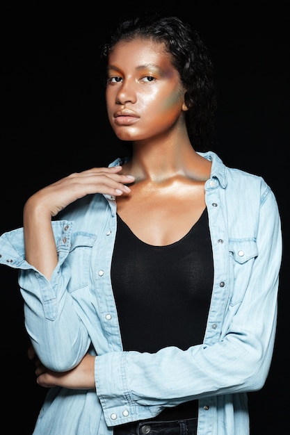 Young model in shirt in studio.