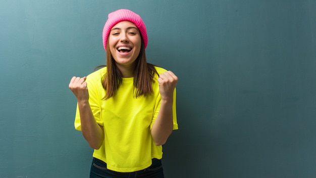 Young modern woman surprised and shocked