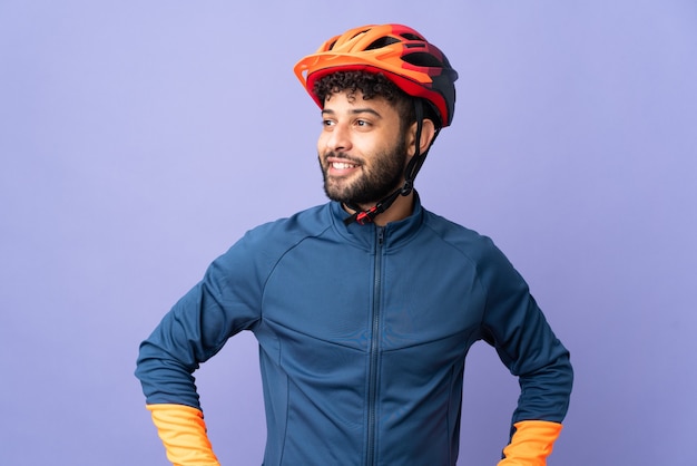 Young Moroccan cyclist man isolated