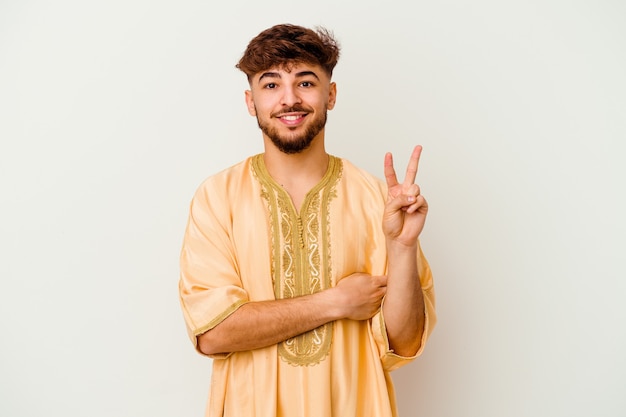 Young Moroccan man isolated on white showing number two with fingers.