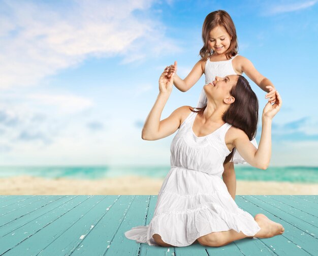 Young mother and her cute little daughter