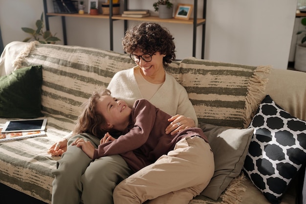 Young mother playing with her child