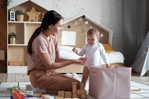 Young mother spending time with baby