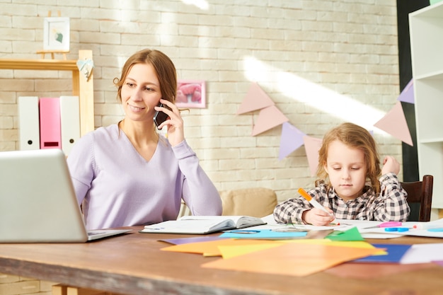 Young Mother Working from Home