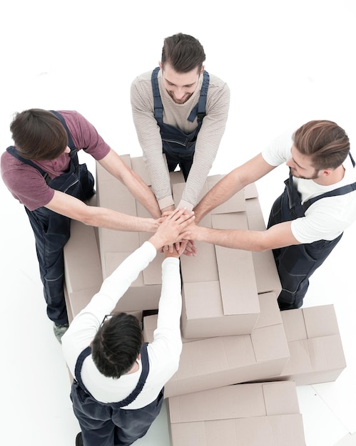 Young movers holding boxes Delivering and transportation concept