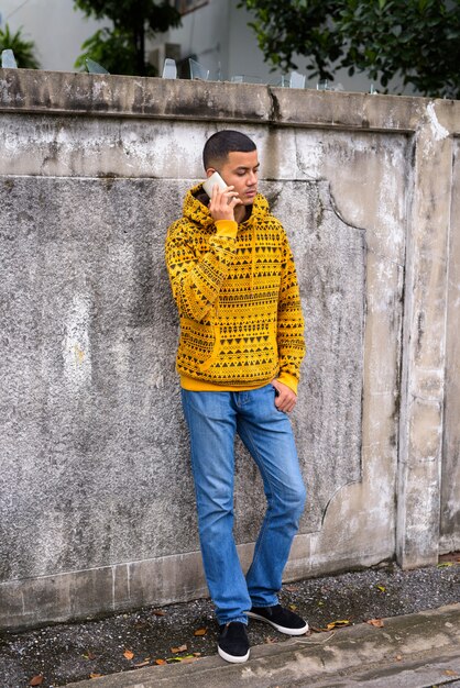 Young multi-ethnic Asian man in the streets outdoors