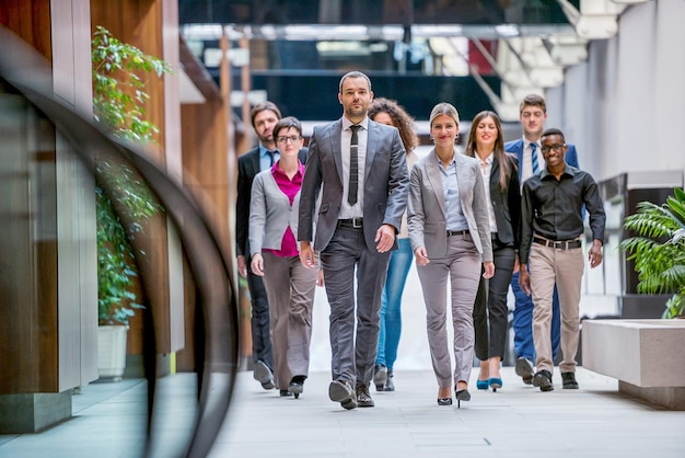 young multi ethnic business people group walking standing and top view